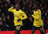 Nketiah celebrates a goal at the Vitality Stadium, courtesy of Saka's brilliant cross
